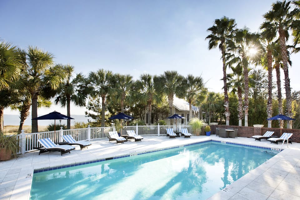 Outdoor pool, pool umbrellas, sun loungers