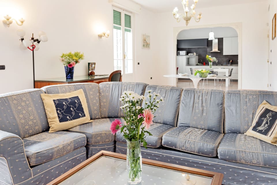 Apartment, 4 Bedrooms | Living area | Flat-screen TV