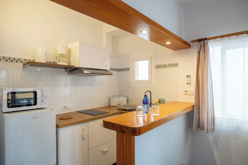 Superior Suite, 1 Bedroom | Minibar, desk, laptop workspace, iron/ironing board