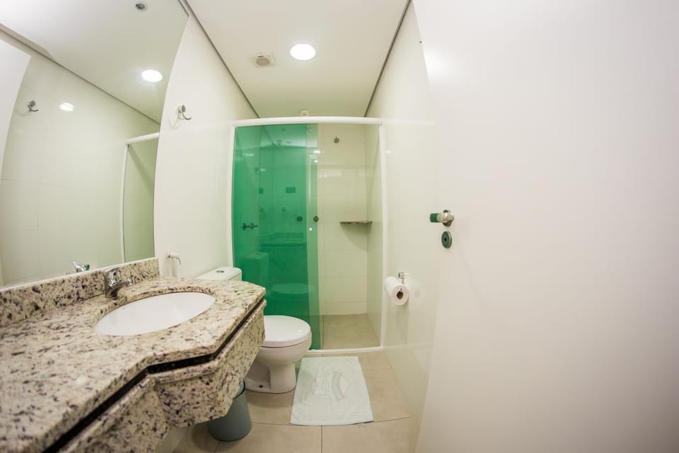Shower, designer toiletries, hair dryer, bathrobes