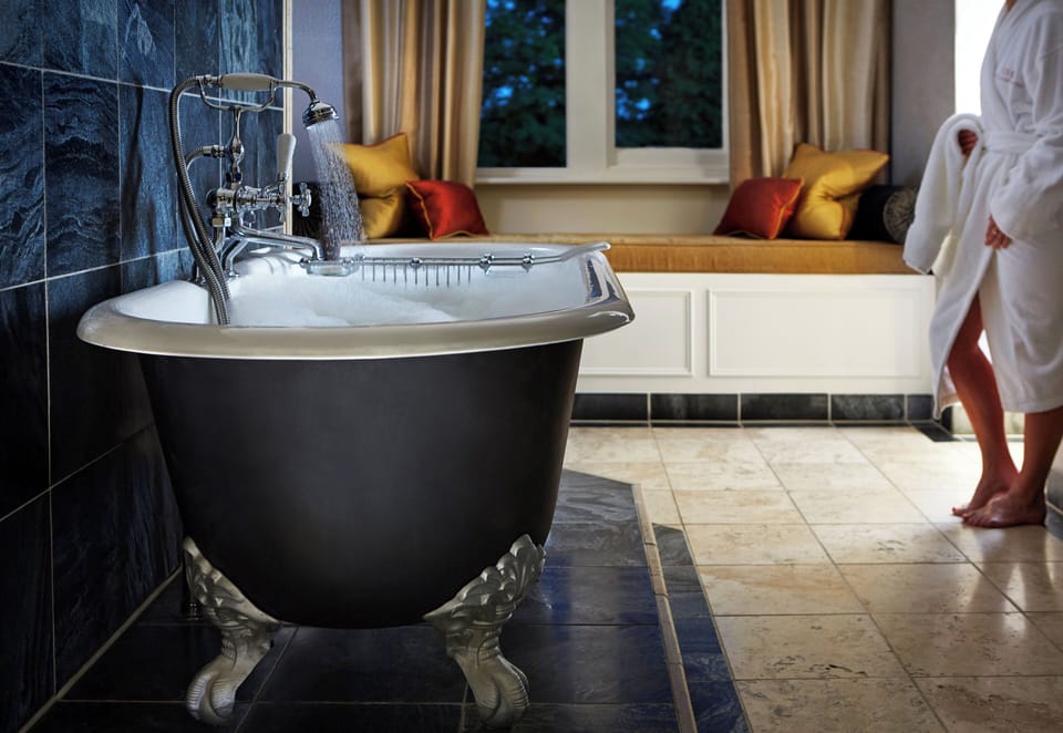 Traditional Suite | Bathroom | Shower, designer toiletries, hair dryer, bathrobes