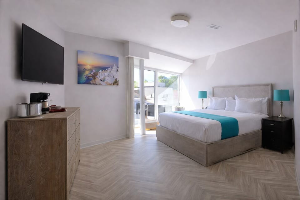 Luxury Suite - Bedroom w/ King Bed and 65'' TV and Livingroom with Sofa Queen Bed and another 65' TV | Egyptian cotton sheets, premium bedding, down comforters, pillowtop beds