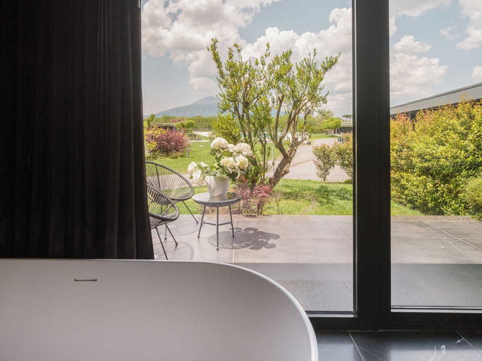 Deluxe Double Room, 1 Bedroom, Bathtub, Pool View | Premium bedding, minibar, blackout drapes, soundproofing
