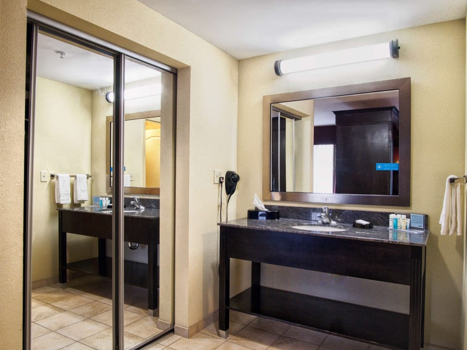 Hair dryer, towels, soap, shampoo