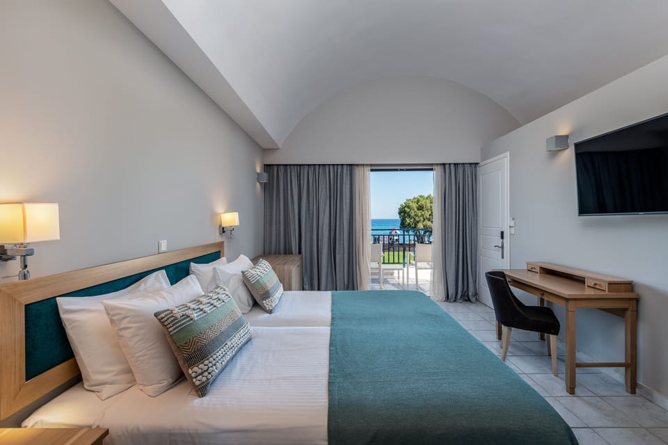 Double Room Sea View | Resort Area | In-room safe, desk, free WiFi, bed sheets