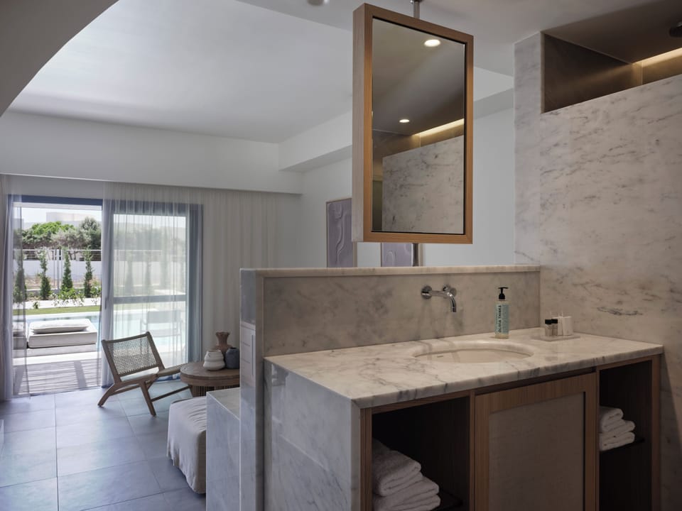 Maisonette Suite Private Pool | Residences Area | Bathroom | Bathtub, free toiletries, hair dryer, bathrobes