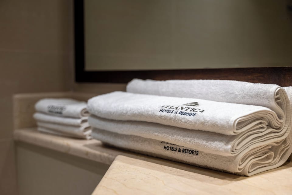 Resort Room Sliding Doors Limited Sea View | Resort Area | Bathroom | Bathtub, free toiletries, hair dryer, bathrobes
