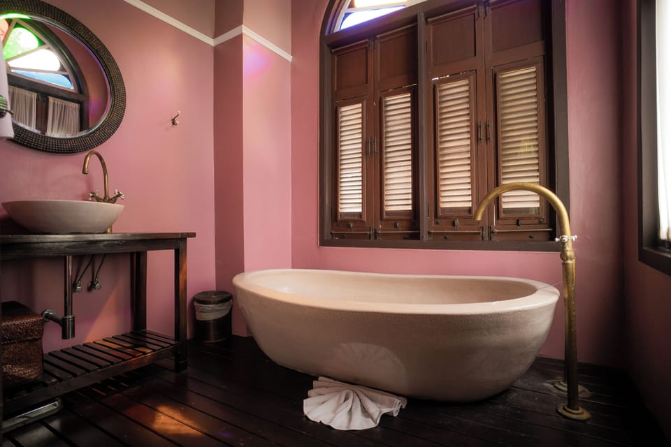 Luxury Suite, River View (Chao Praya) | Bathroom | Rainfall showerhead, designer toiletries, hair dryer, bathrobes