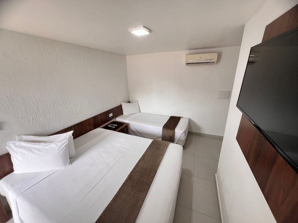 Apto Casal+1 | Minibar, in-room safe, bed sheets
