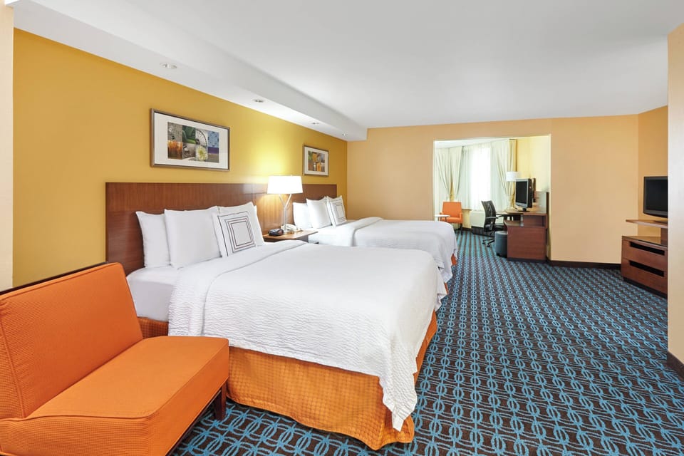 Suite, Multiple Beds | In-room safe, desk, iron/ironing board, free cribs/infant beds