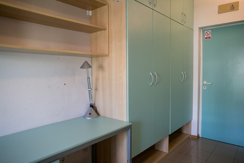 Desk, free WiFi, bed sheets