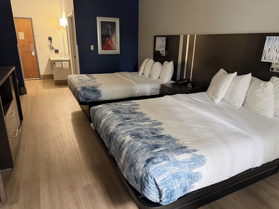 Premium Room, 2 Queen Beds | Bathroom | Bathtub, free toiletries, hair dryer, towels