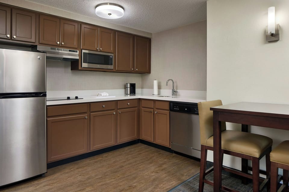 Studio, 1 King Bed, Balcony | Private kitchen | Coffee/tea maker, full-size fridge, microwave, stovetop