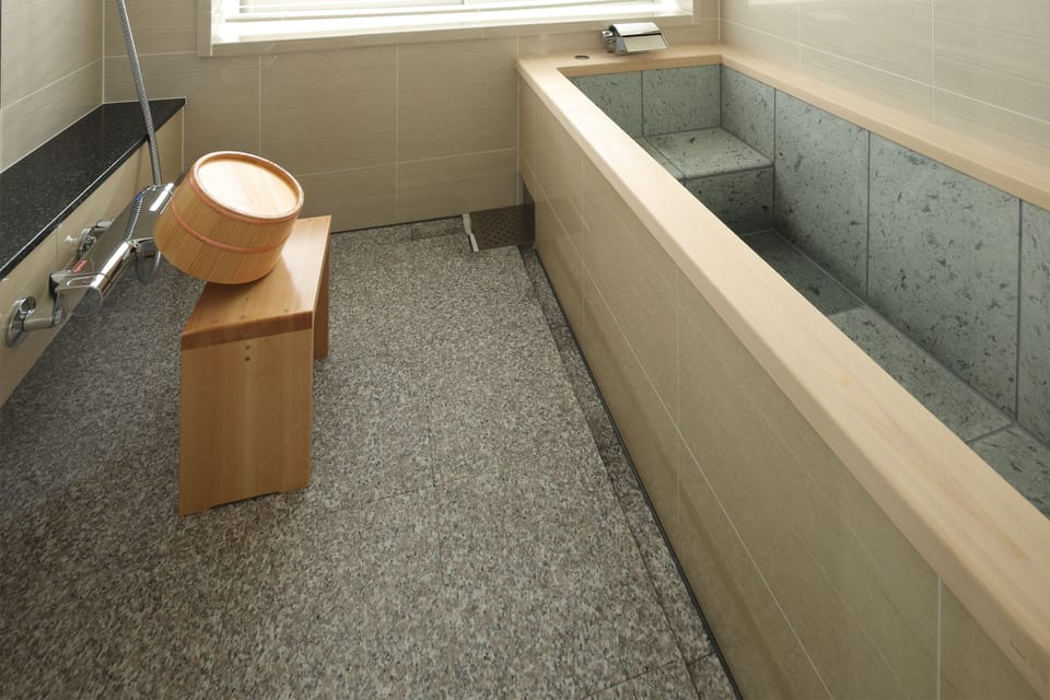 Karaku Suite, Non Smoking | Bathroom | Combined shower/tub, free toiletries, hair dryer, slippers