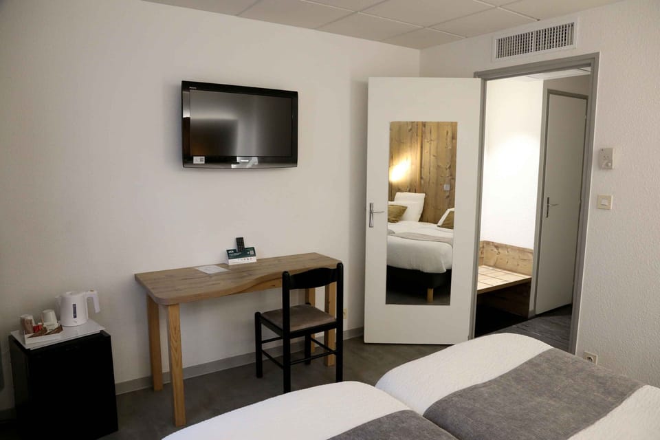 Minibar, desk, laptop workspace, blackout drapes