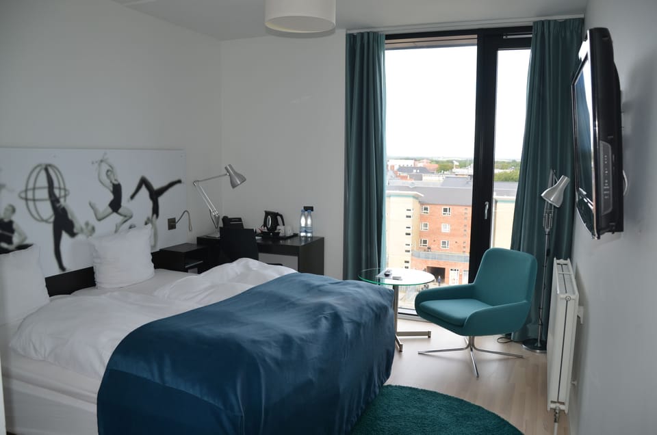 Hypo-allergenic bedding, pillowtop beds, in-room safe, desk