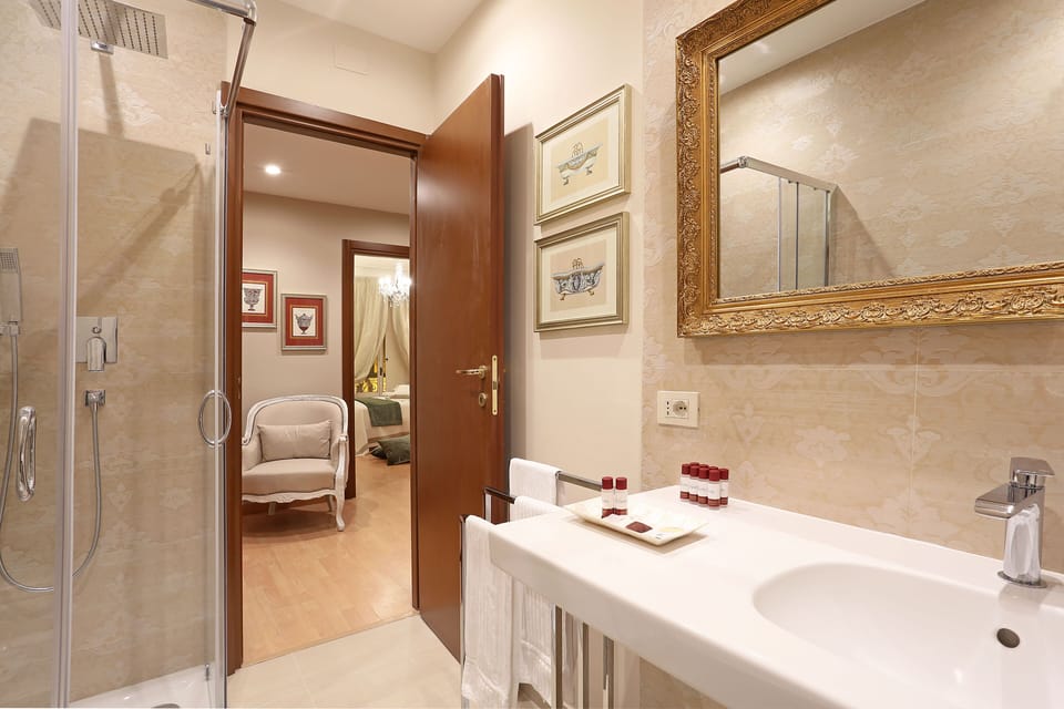 Apartment, 2 Bedrooms | Bathroom | Shower, rainfall showerhead, hair dryer, towels
