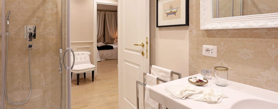 Apartment, 2 Bedrooms | Bathroom | Shower, rainfall showerhead, hair dryer, towels