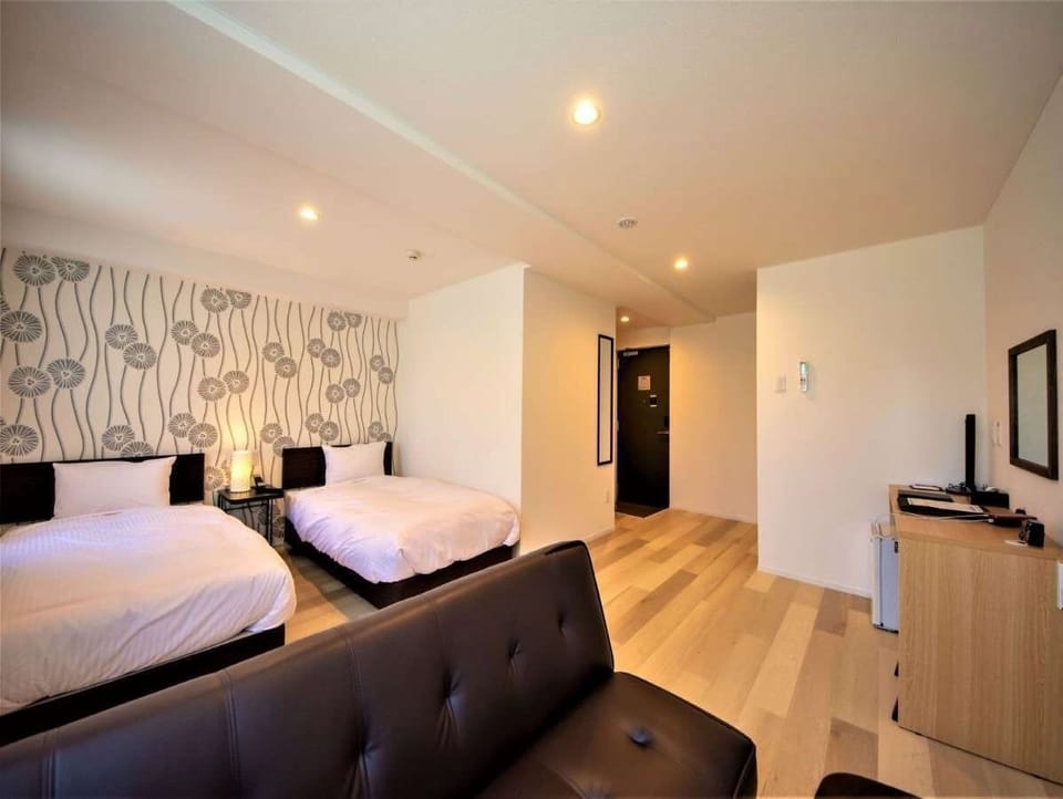 Standard Triple Room, Non Smoking | Down comforters, desk, laptop workspace, blackout drapes