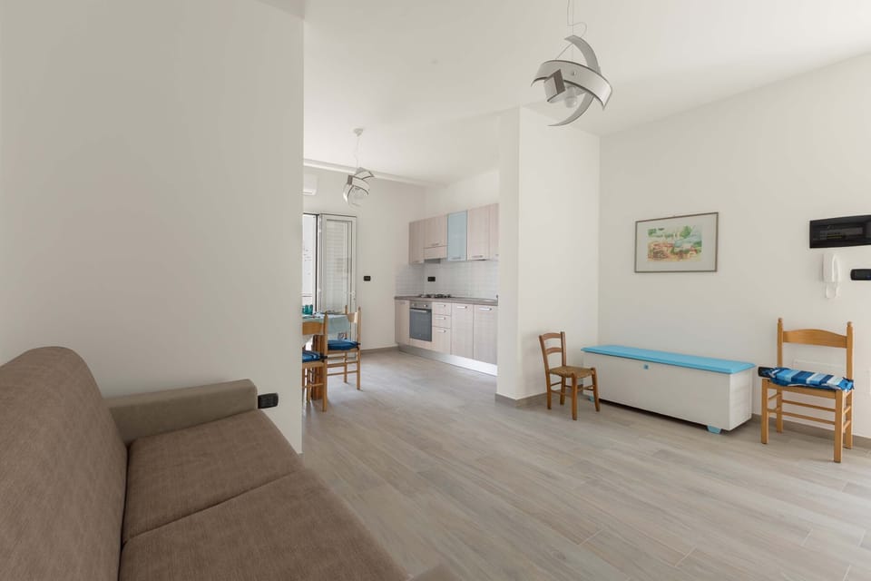 Standard Apartment, 1 Bedroom | Living area | Flat-screen TV