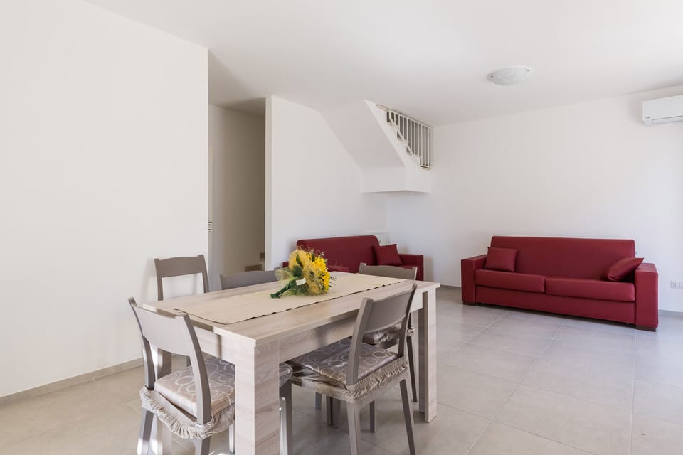 Comfort House, 2 Bedrooms | Living area | Flat-screen TV