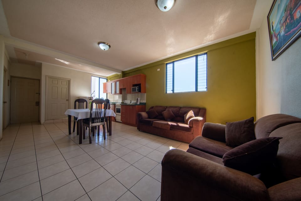 Apartment, 2 Bedrooms, Kitchen | Living area | 32-inch flat-screen TV with cable channels, TV