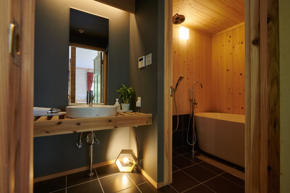 Kouya | Bathroom | Separate tub and shower, free toiletries, hair dryer, slippers