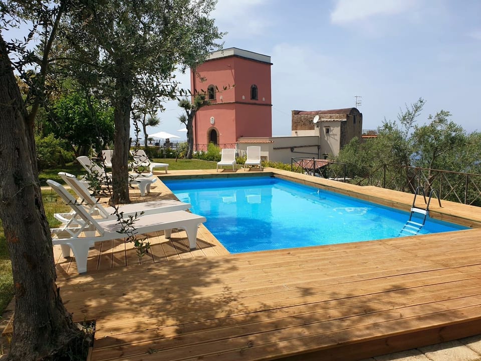 Seasonal outdoor pool, pool umbrellas, sun loungers