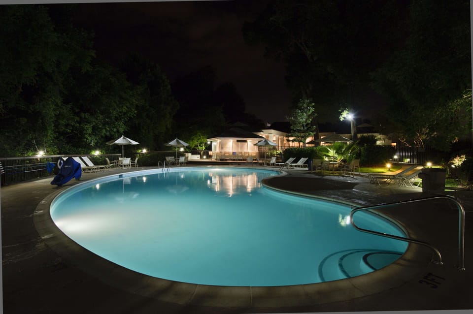 Outdoor pool, open 9:00 AM to 10:00 PM, pool umbrellas, sun loungers