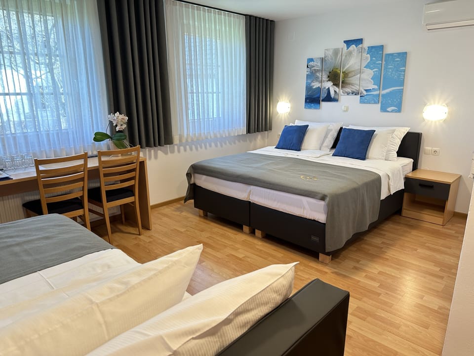 Standard Triple Room, Ensuite | Premium bedding, minibar, in-room safe, desk
