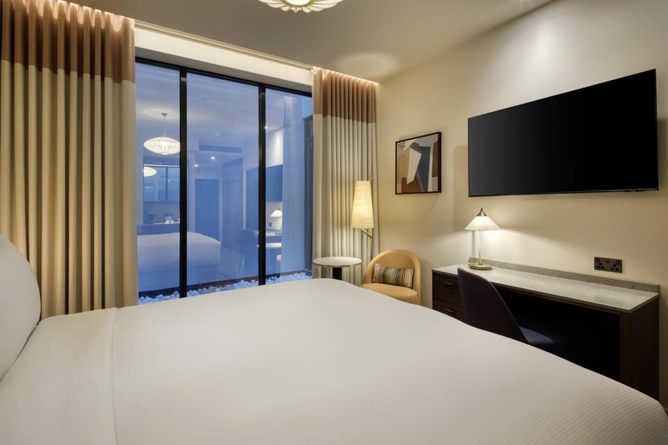 Deluxe Room, 1 King Bed (Superior) | Hypo-allergenic bedding, in-room safe, laptop workspace, blackout drapes