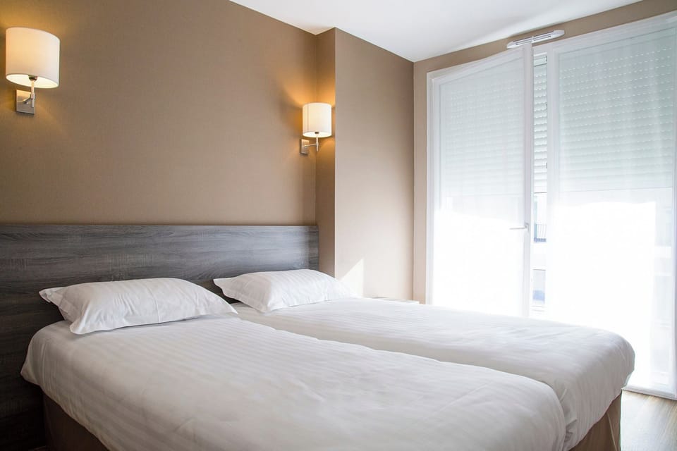 Twin Room | Premium bedding, Select Comfort beds, individually decorated