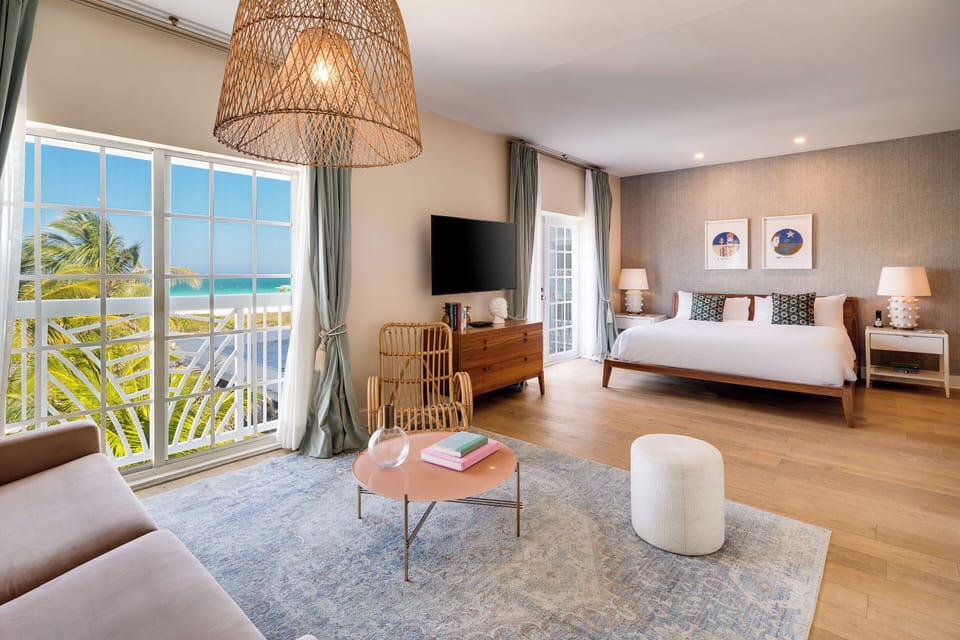 Suite, 1 King Bed with Sofa bed, Balcony, Oceanfront | Living area | 50-inch flat-screen TV with digital channels, TV