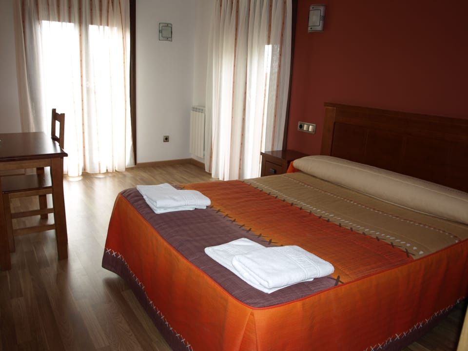 Individually decorated, desk, blackout drapes, rollaway beds