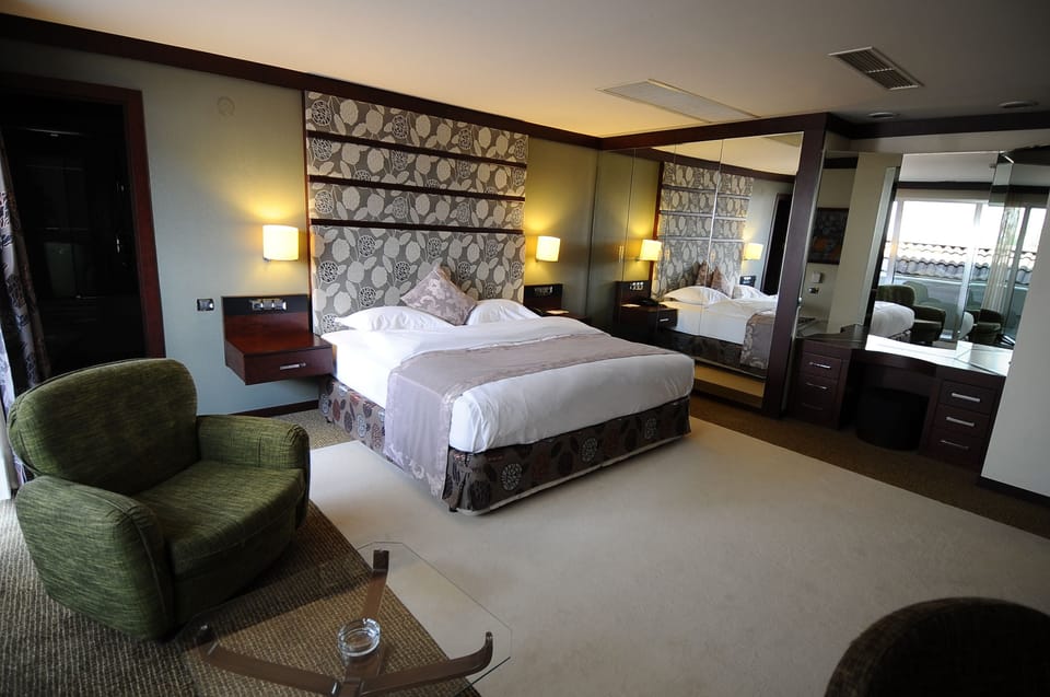 Premium bedding, memory foam beds, minibar, in-room safe