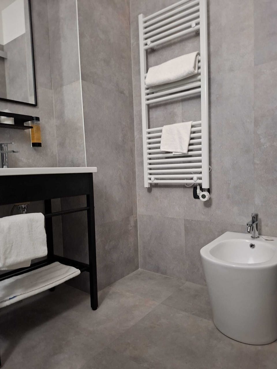 Shower, free toiletries, hair dryer, slippers