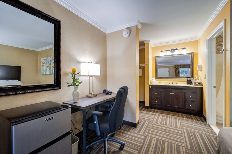 Standard Room, 2 Queen Beds, First or Second Floor | Desk, laptop workspace, blackout drapes, iron/ironing board