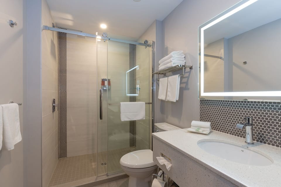 Room, 2 Double Beds | Bathroom | Combined shower/tub, free toiletries, hair dryer, towels