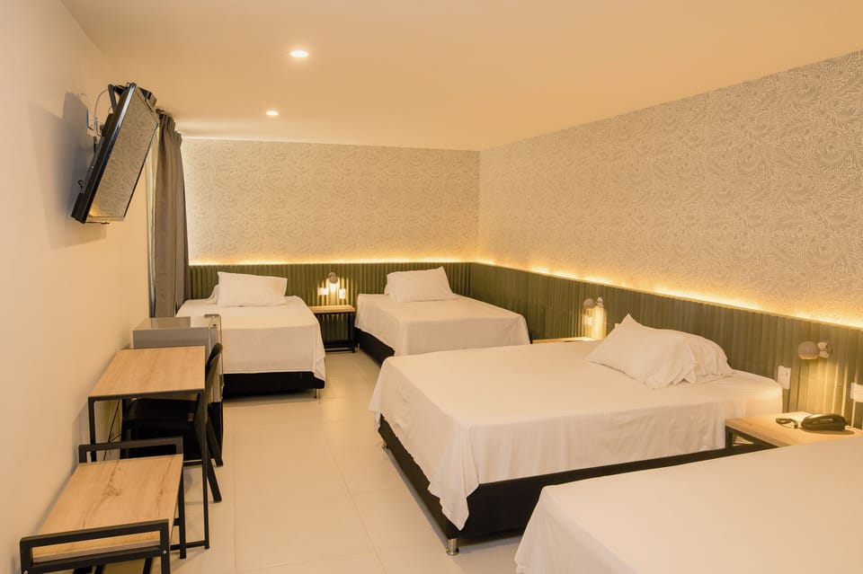 Family Quadruple Room | Premium bedding, minibar, in-room safe, desk