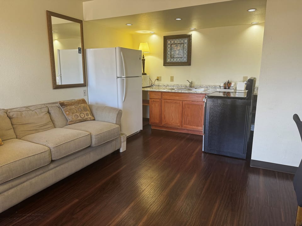 Superior Suite, 1 King Bed, Non Smoking | Private kitchenette | Coffee/tea maker, fridge, microwave