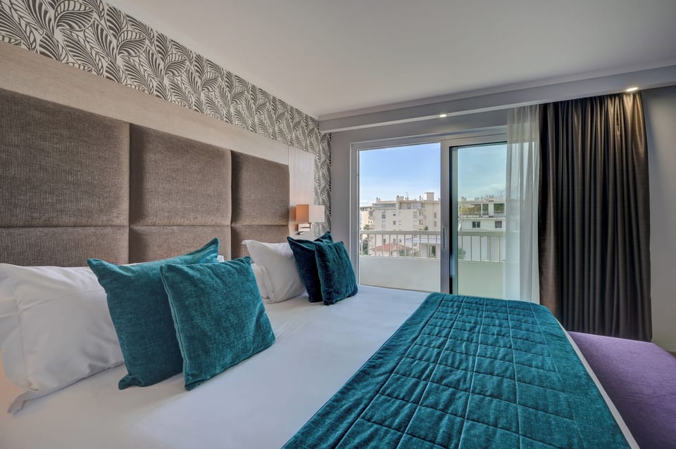 Premium Suite | Minibar, in-room safe, individually decorated, individually furnished