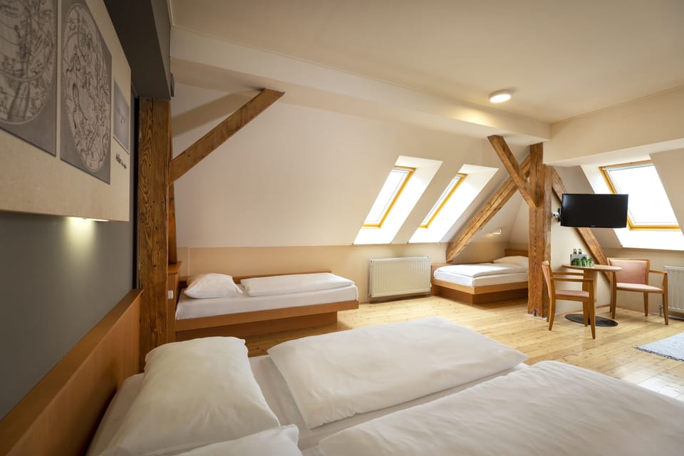 Quadruple Room | In-room safe, desk, WiFi (free), individually decorated