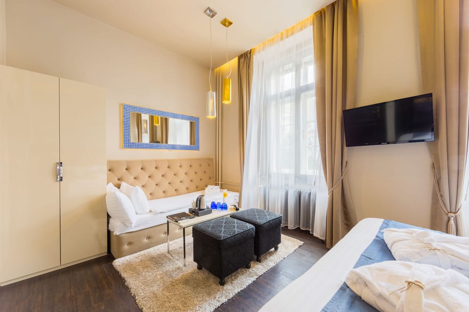 Superior Double or Twin Room | Minibar, in-room safe, desk, iron/ironing board