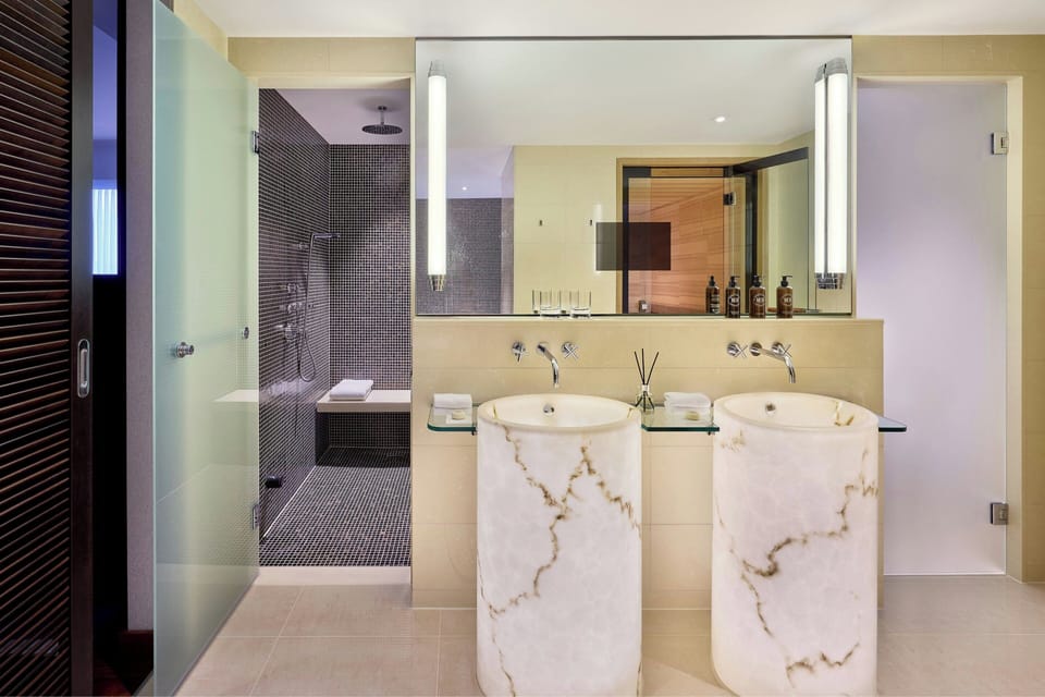 Presidential Suite, 1 King Bed, Non Smoking | Bathroom | Separate tub and shower, deep soaking tub, rainfall showerhead