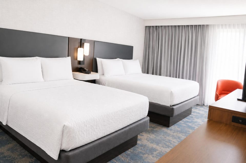 Room, 2 Queen Beds, Non Smoking | In-room safe, iron/ironing board, free cribs/infant beds, free WiFi
