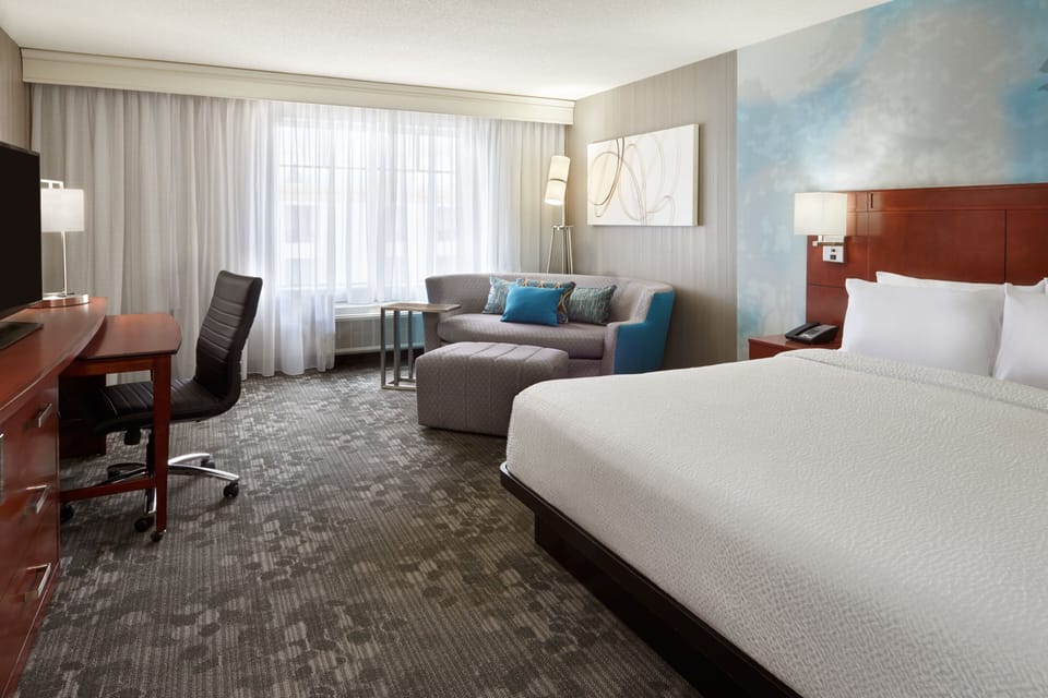 Premium bedding, blackout drapes, soundproofing, iron/ironing board
