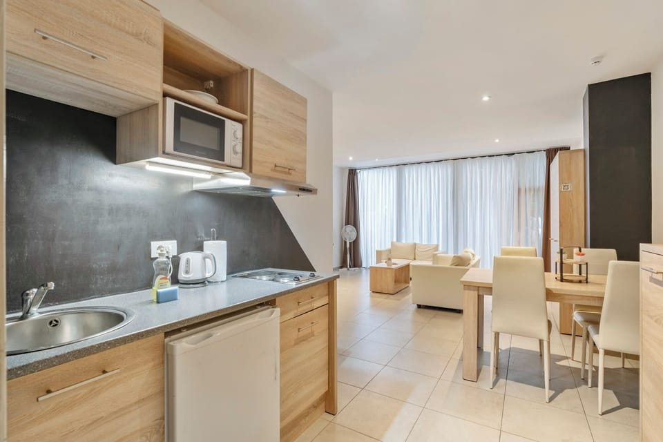 Apartment, 2 Bedrooms | Living area | LCD TV