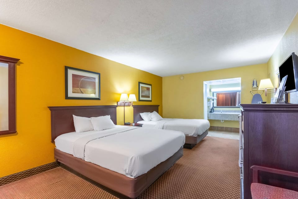 Room, 2 Queen Beds, Smoking | Individually decorated, individually furnished, desk, laptop workspace