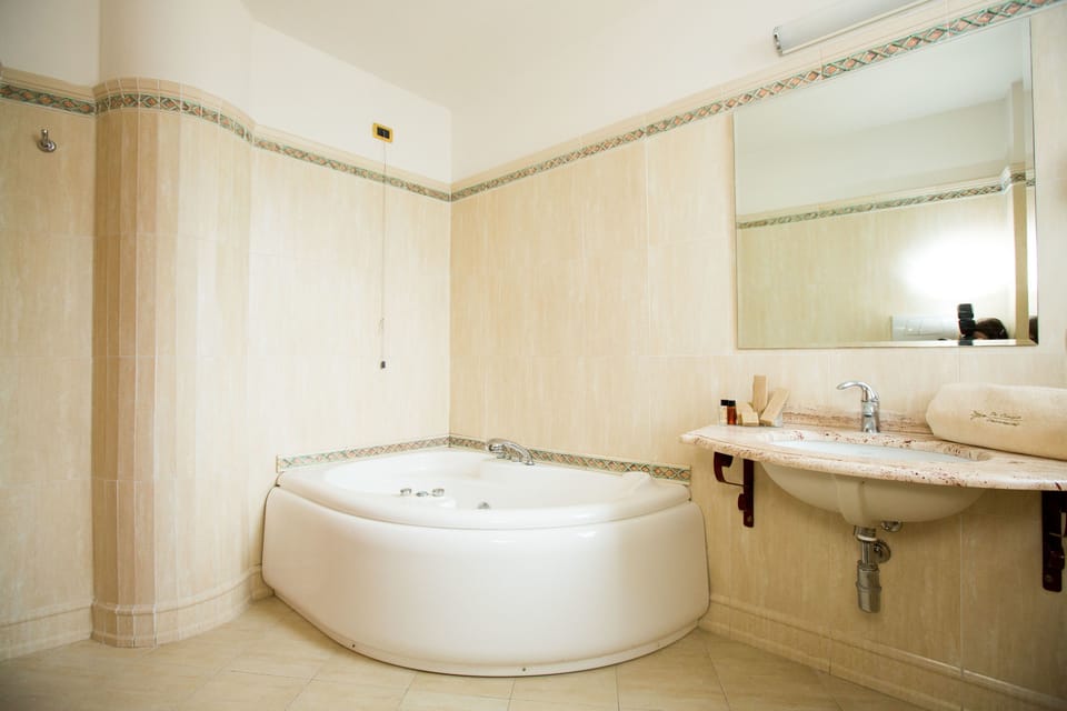 Rainfall showerhead, free toiletries, hair dryer, slippers