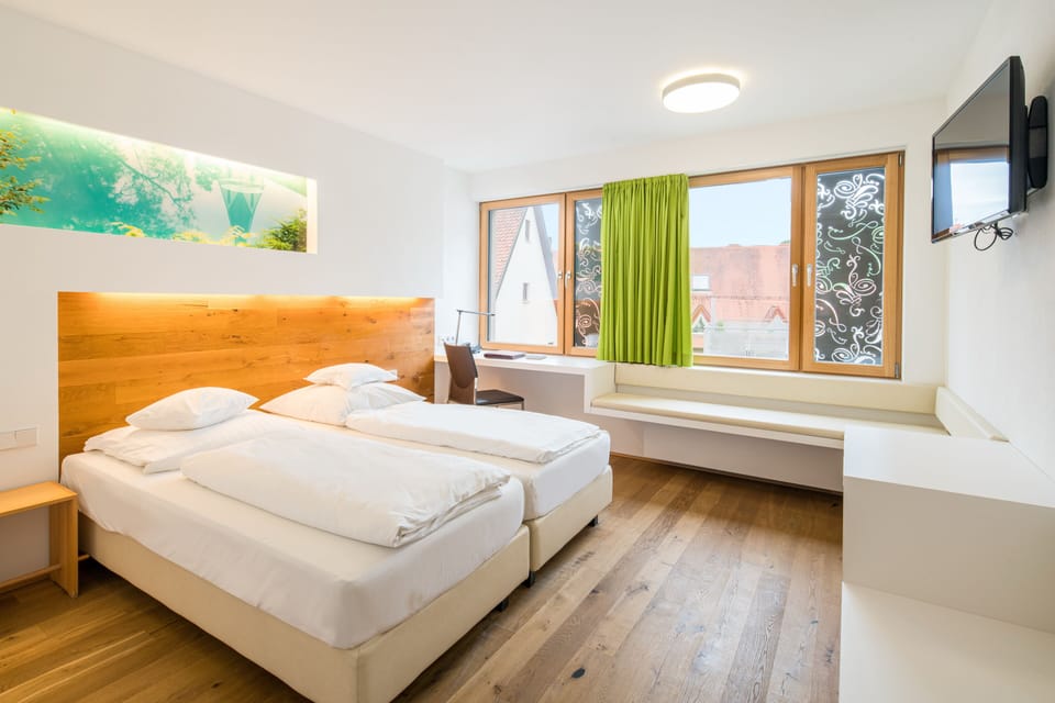 Premium bedding, Select Comfort beds, desk, laptop workspace